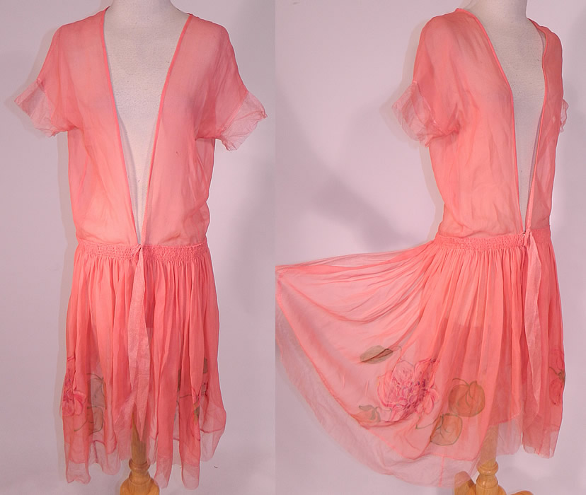 Vintage Hand Painted Lotus Flower Petal Skirt Coral Pink Silk Chiffon Dress Robe
This vintage hand painted lotus flower petal skirt coral pink silk chiffon dress robe dates from the 1920s. It is made of a sheer coral pink silk chiffon fabric, with hand painted pastel water lilies, lotus flowers, leaf pad designs along the side petal shaped bottom skirt.
