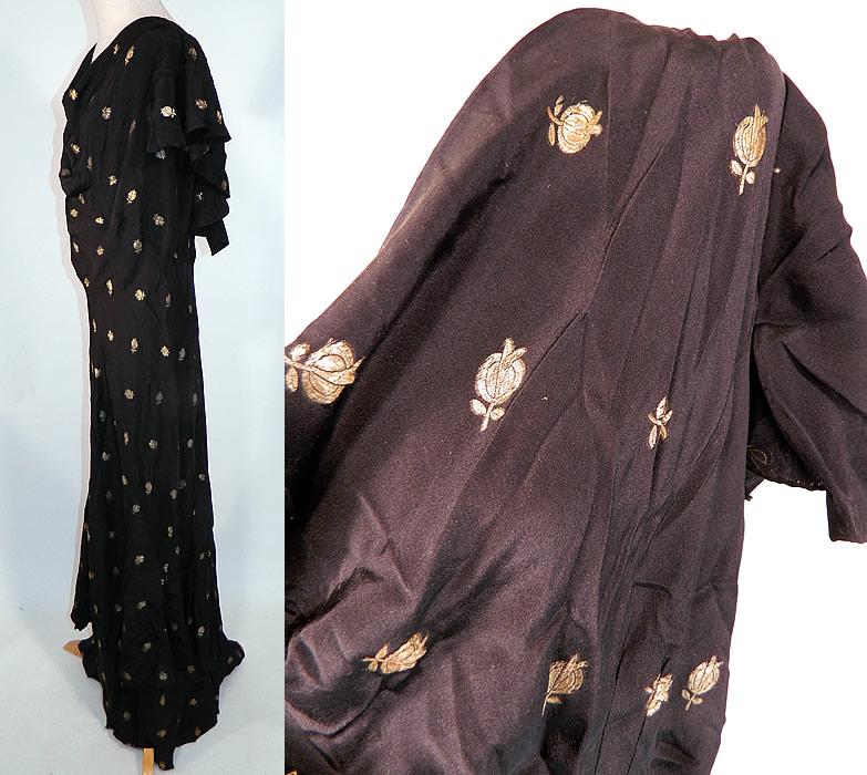 Vintage Black Silk Gold Lamé Lame Pomegranate Bias Cut Evening Gown Dress
This beautiful bias cut evening gown dress is a long floor length with a tired layered slight back train skirt, weighted drape front neckline, plunging V back, short flared cap sleeves, snap closures and is unlined. 