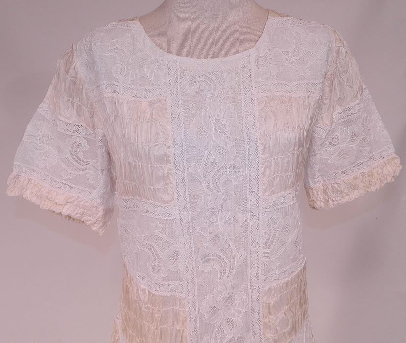 Vintage White Lace Cream Silk Smocking Ruched Gathering Summer Maxi Dress
This lovely lace maxi dress is a long length, loose fitting, with short sleeves, gathering around the cuffs, a fitted waist, snap closures down the back and is fully lined, with a white cotton slip, lace trim hemline lining sewn inside. 