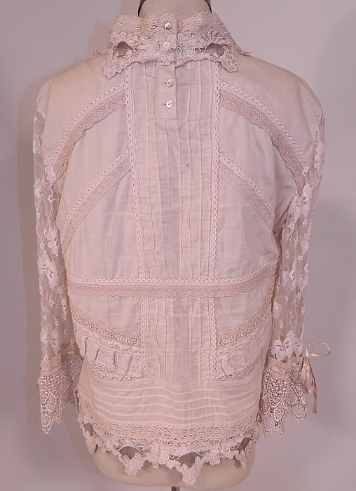 Vintage Whistles London Cream Lace Cotton Embroidered Applique Trim Blouse Shirt
This beautiful blouse has a pull over style, with tiny mother of pearl button back top, high neck lace collar, with long sheer lace sleeves, flared cuffs with drawstring ribbon woven through it and is unlined. 