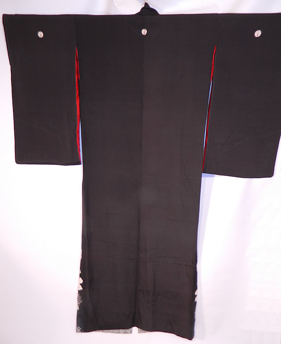 Vintage Japanese Geisha Formal Family Crest Mon Black Silk Screen Floral Kimono
The kimono measures 62 inches long, with 27 inch long kimono sleeves and is 25 inches across the shoulders. It is in good condition, with only a small rip along the seam of the bottom inside lining. This is truly a wonderful piece of wearable Japanese textile art!