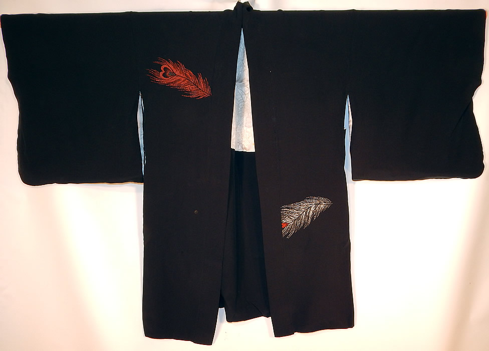 Vintage Japanese Family Crest Mon Black Silk Metallic Peacock Feather Haori Kimono
It is hand stitched, made of a black silk crepe fabric, with a colorful metallic red, silver and gold lam&eacute; woven design of peacock feathers, heart shaped eyes. 