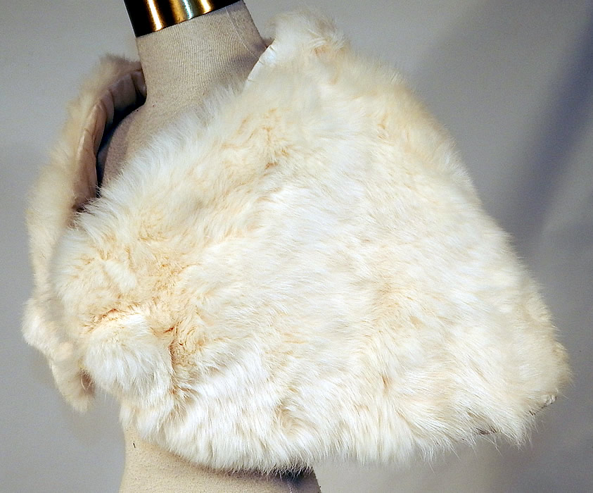 Vintage White Rabbit Fur Shrug Stole Shawl Winter Wrap Glam Evening Cape
This vintage white rabbit fur shrug stole shawl winter wrap glamorous evening cape dates from the 1950s.