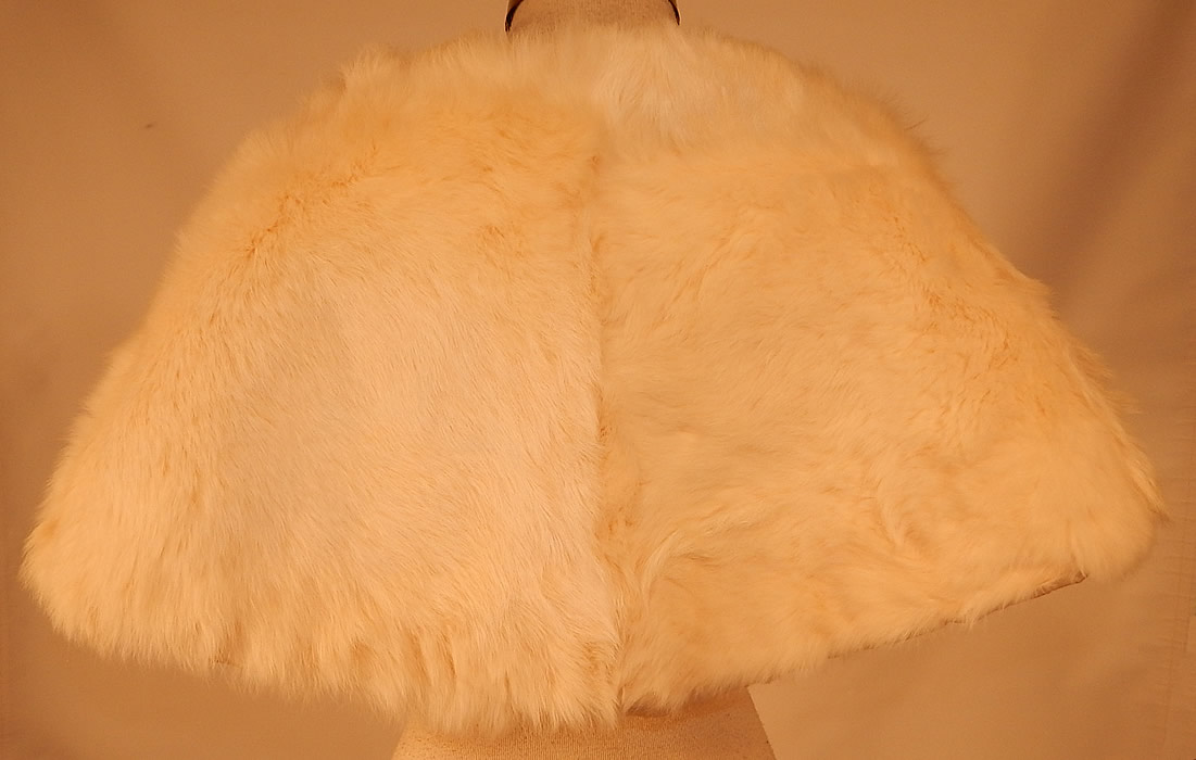 Vintage White Rabbit Fur Shrug Stole Shawl Winter Wrap Glam Evening Cape
The cape measures 13 inches long and 56 inches in circumference around the bottom.