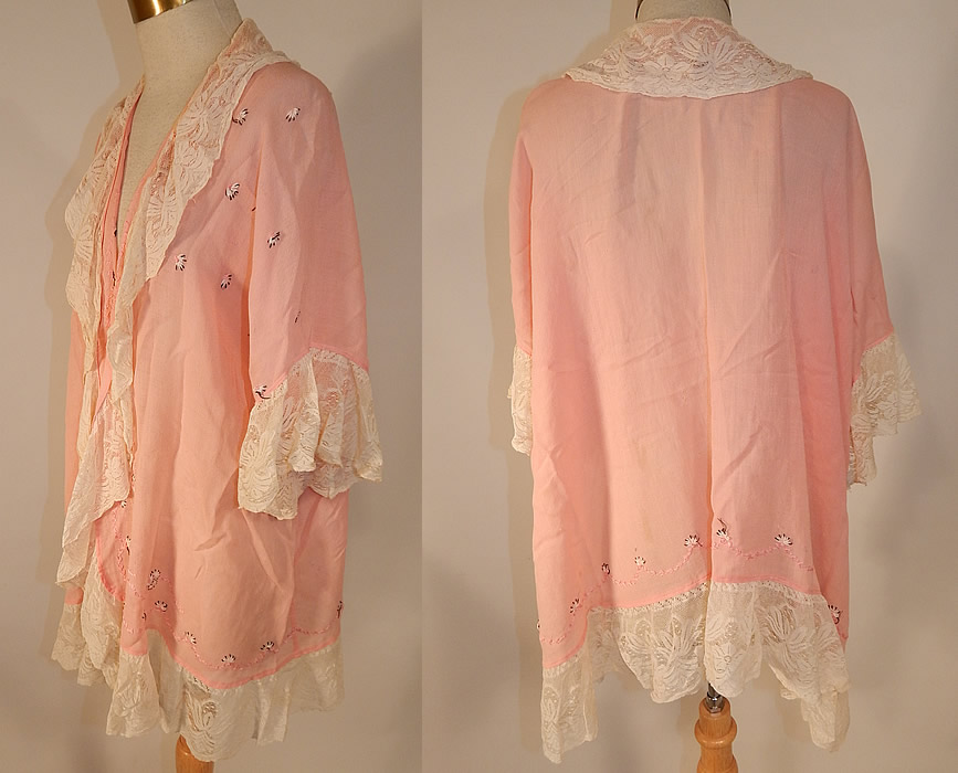 Vintage Pink Cotton Embroidered Daisies Lace Trim Flapper Peignoir Robe Bed Jacket
The robe measures 32 inches long, with a 45 inch waist and 45 inch bust. It is in good condition, with a faint stain on the back. This is truly a wonderful piece of flapper wearable lingerie art! 