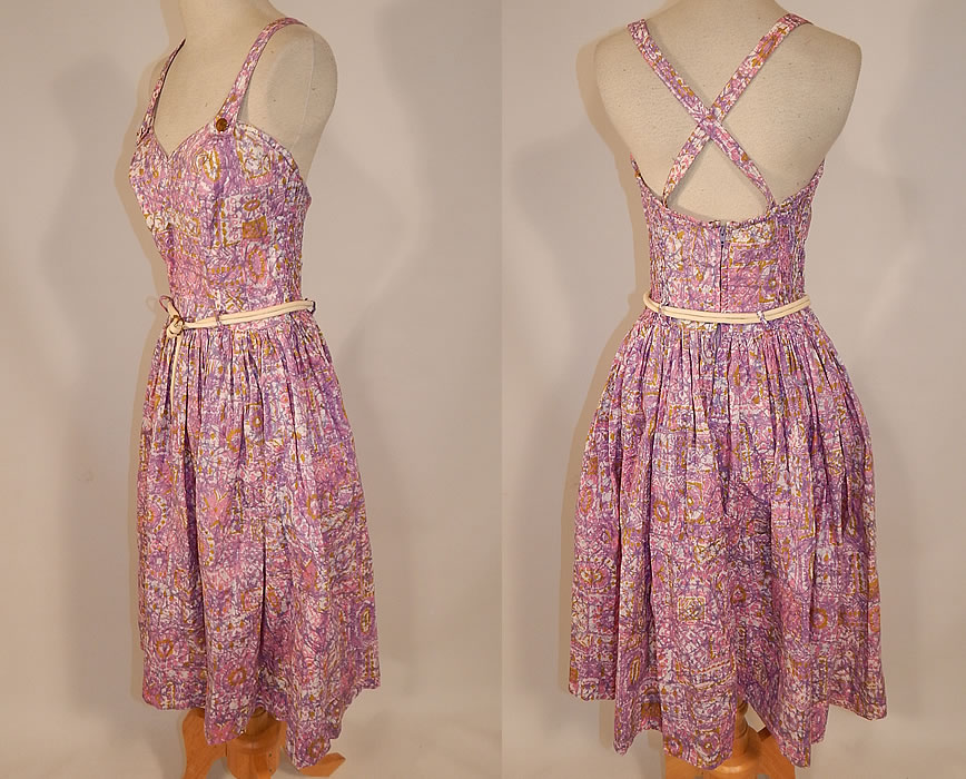 Vintage Catalina Sportswear Pink Cotton Novelty Print Belted Circle Skirt Dress
his retro summer sundress has adjustable button shoulder straps criss crossing on the back, a sweetheart neckline, with built in shelf bra top lining, white cord rope gold metal buckle belt, full circle skirt, with an elastic ruched smocking back and zipper closure.