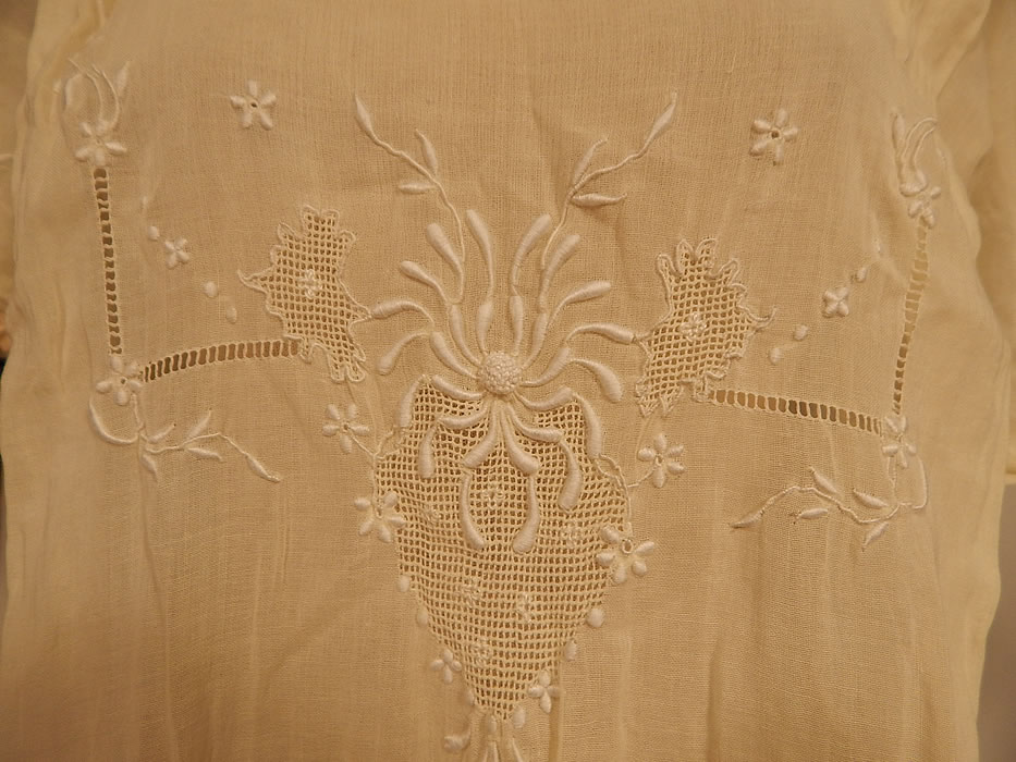 Vintage Boho Yellow Cotton Batiste Embroidered Drawn Cut Work Drop Waist Dress
This beautiful boho white work summer dress is loose fitting, with a drop waist, slight pleated gathering along the sides, short puffy sleeves and is sheer, unlined.
