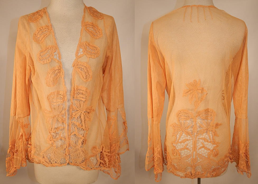 Vintage Antique Peach Ecru Net Battenburg Lace Coat Jacket Bell Sleeves
This vintage antique peach ecru net Battenburg lace coat jacket three bell sleeves dates from the 1920s. It is made of a peachy ecru cream color sheer net fabric, with Battenburg lace floral leaf pattern designs and connecting brides and bars.