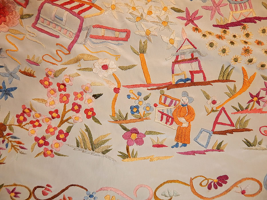 Antique Cream Silk Pastel Embroidered Figural Floral Chinese Canton Piano Shawl
The shawls fabric square measures 58 by 58 inches. This exceptional quality made Manton Canton Chinese Cantonese style Spanish Flamenco shawl is quite heavy weighing over 2 pounds. 