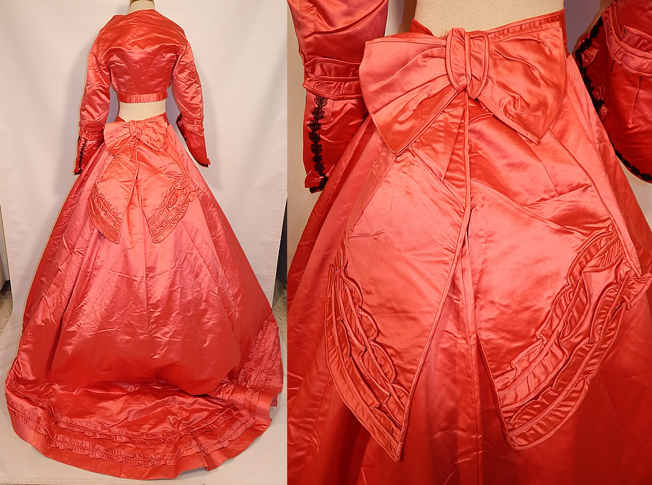 Victorian Magenta Pink Silk Ball Gown With Train Skirt 2 Bodices & Bow Belt
The first bodice has long sleeves, with flared bell shape cuff, black Chantilly lace trim, a V front neckline, button front closure and is fully lined. 