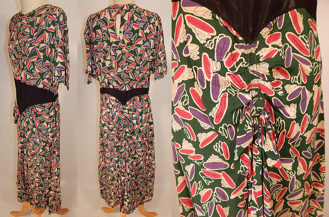 Vintage Green Pink Purple Coil Springs Abstract Novelty Print Rayon Peplum Dress
This unique novelty print dress has a peplum skirted waist, with bustle bow gathering on the back skirt, a black cummerbund waist trim , short sleeves with shoulder slits, a key hole opening back and side zipper closure. 