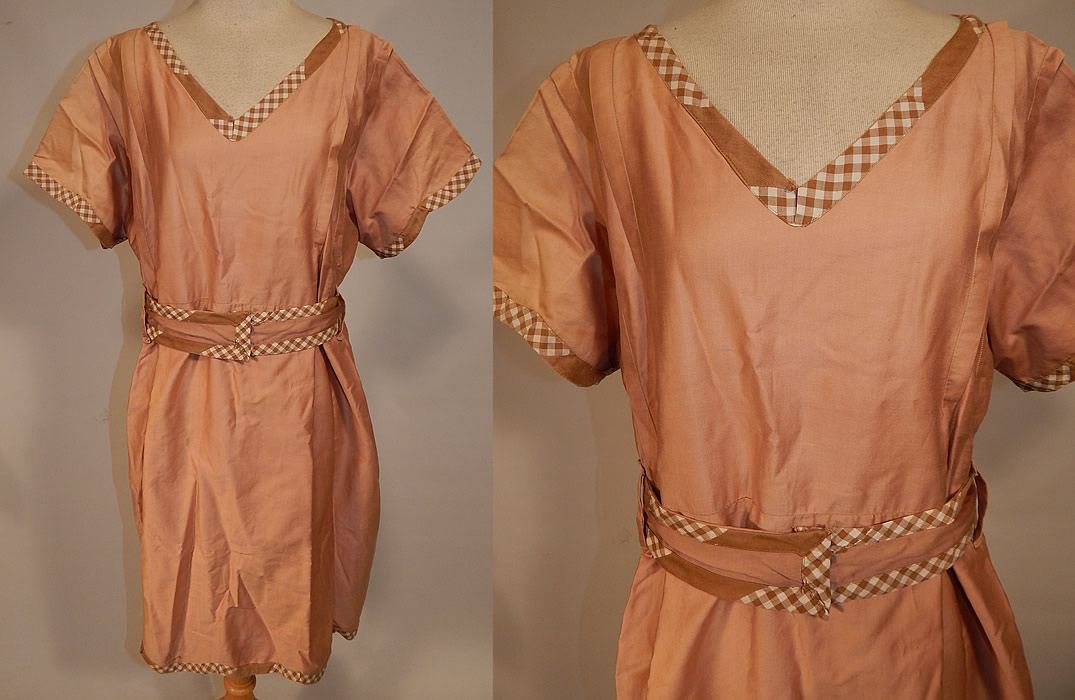 Vintage Edwardian Tan Cotton Gingham Trim Belted Bathing Swimsuit Dress
This vintage Edwardian era tan cotton gingham trim belted bathing swimsuit dress dates from 1910. It is made of a pale brown tan color polished cotton fabric, with a tan & white gingham checked trim edging and belt.