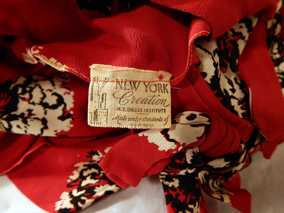 Vintage NY Creation Red Black & White Clover Flower Novelty Print Rayon Dress
There is a "New York Creation N.Y. Dress Institute" label sewn inside. 