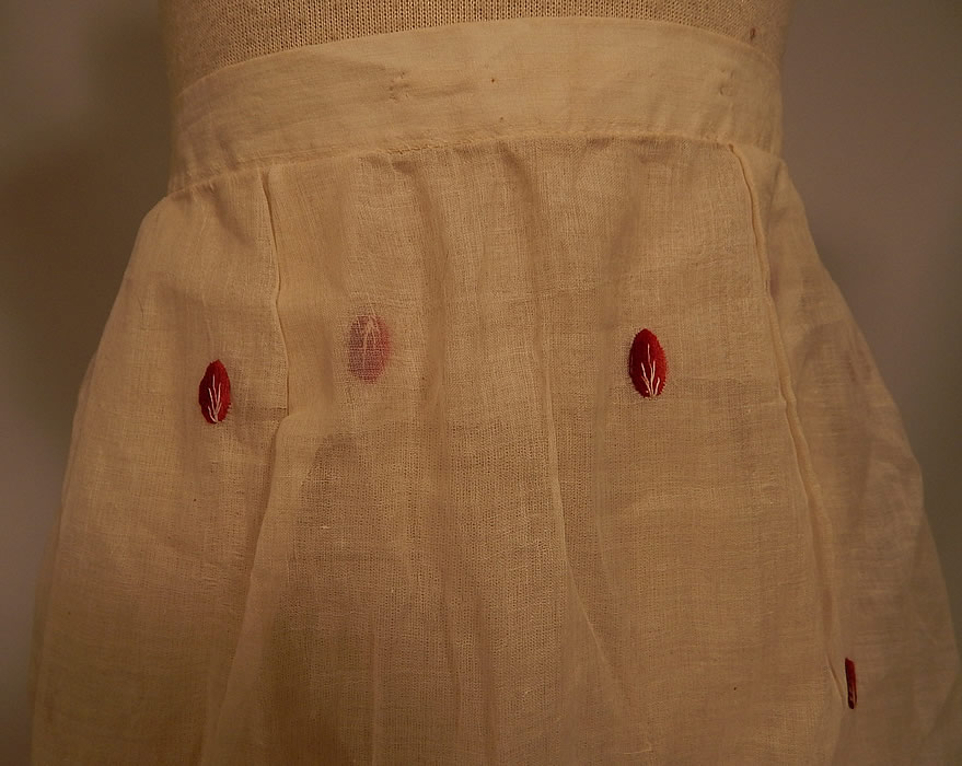 Victorian White Cotton Organdy Fabric Red Berry Polka Dot Embroidered Skirt
This stunning summer skirt is a long floor length, with a ruffle bottom hem, fitted waistband, back pleated gathering, a mother of pearl button closure on the back and is sheer, unlined.