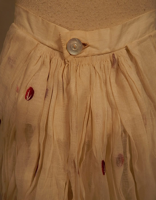 Victorian White Cotton Organdy Fabric Red Berry Polka Dot Embroidered Skirt
The skirt measures 38 inches long, with a 22 inch waist. It is in good condition, but has not been cleaned. This is truly a wonderful piece of antique Victoriana wearable art!