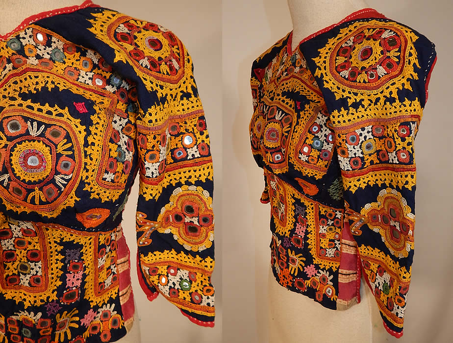 Vintage Antique Indian Gujarati Kutch Work Embroidered Mirror Choli Boho Blouse Top
This stunning traditional handmade hand embroidered fitted, short cropped choli boho blouse top has an open back with two adjustable back tie strap closures and is fully lined in a red cotton floral print fabric inside.