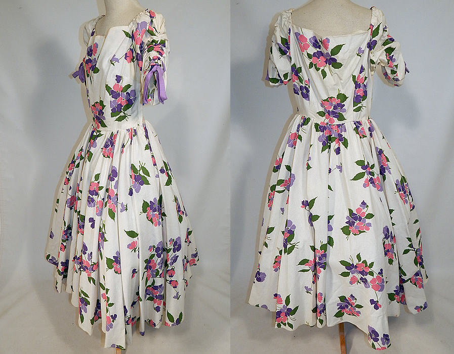 Vintage White Cotton Pique Pansy Print Full Circle Skirt Dress
The dress is a large size measuring 48 inches long, with a 30 inch waist, 40 inch bust and 260 inch circumference circle skirt. It is in good condition, but has not been cleaned with some slight faint discoloration along the neckline (see close-up). This is truly a wonderful piece of custom made retro vintage textile art!
