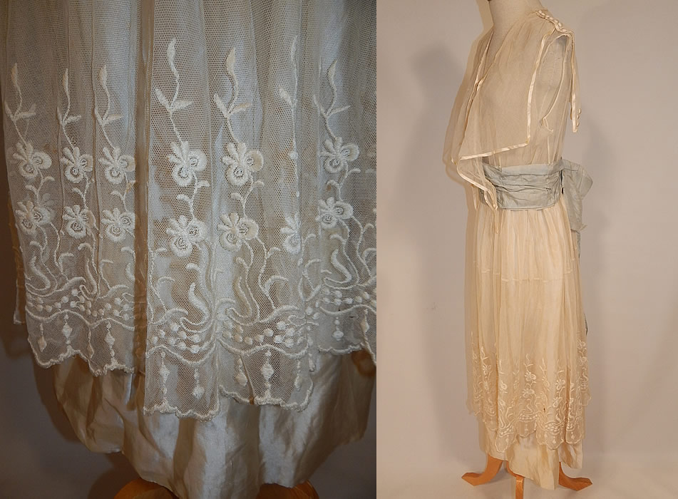Edwardian White Net Embroidered Lace Sailor Middy Top Blue Sash Belted Dress
This lovely lace long tea length dress has a middy top overlay with sailor collar, silk button trim accents, is sleeveless, with a blue silk ribbon sash belted back bow waist, snap closures down the front top, around the waist and is sheer, lined only in net on the top and white silk on the skirt.