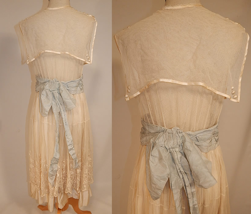 Edwardian White Net Embroidered Lace Sailor Middy Top Blue Sash Belted Dress
The dress measures 46 inches long, with a 24 inch waist and 34 inch bust. It is in good condition, but has not been cleaned and has a few small slight faint age spot stains on the top and appears that the sleeves were removed. This is truly a wonderful piece of wearable antique textile lace art!