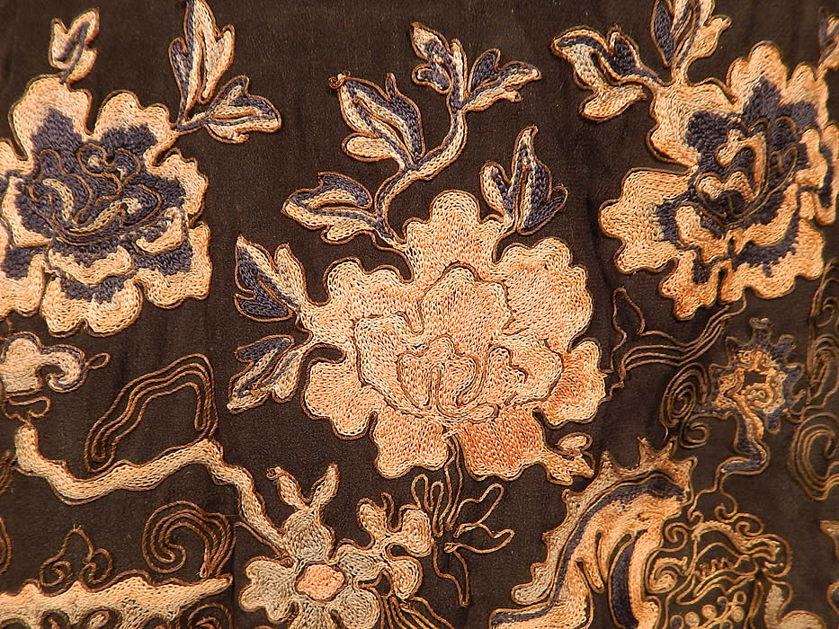 Antique Chinese Silk Forbidden Stitch Gold Couching Embroidery Tunic Tabard Dress
This exquisitely embroidered Chinese inspired tunic tabard style dress has two matching embroidered apron panels on the front and back attached at the shoulders, with open sides, a rounded neckline and silk pastel floral damask ribbon trim edging.