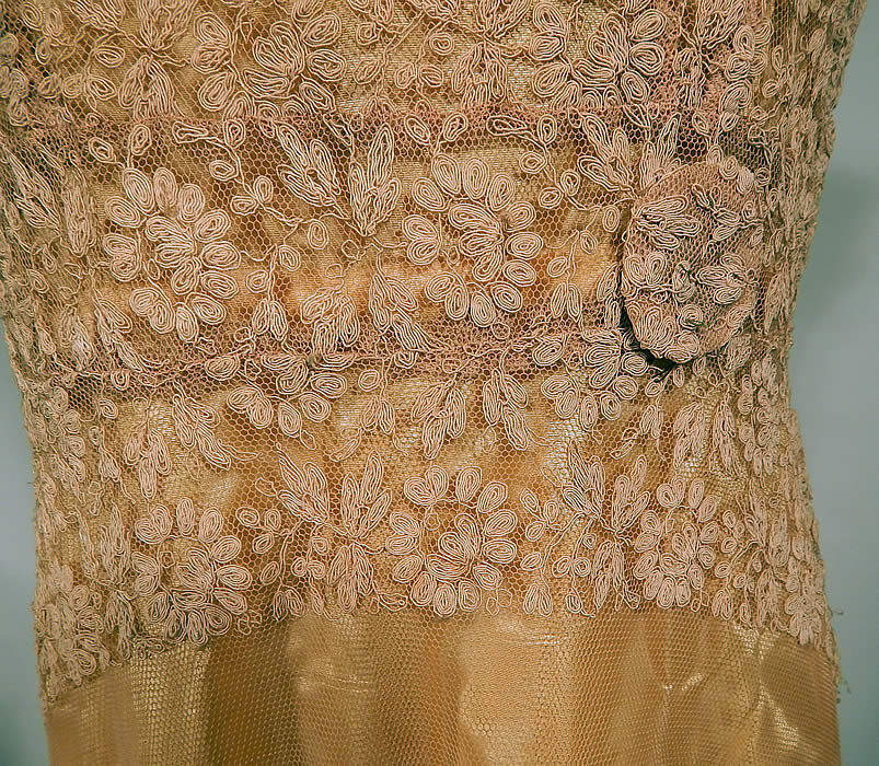 Vintage Ecru Cream Tambour Embroidery Net Lace Skirt Train Wedding Gown Dress
The dress measures 50 inches long in the front, 58 inches long in the back, with a 30 inch waist and 36 inch bust. It is in good condition, but has not been cleaned and has some slight faint discoloration, dingy in areas. This is truly a wonderful piece of wearable wedding bridal lace art!