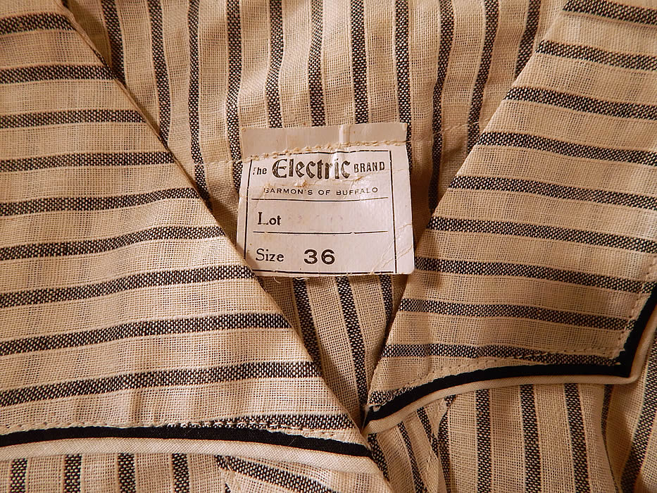 Edwardian Electric Brand Black & White Striped Cotton Workwear House Dress NWT
The dress measures 54 inches long, with a 26 inch waist and 36 inch bust. It is in excellent never worn condition, with all of the original tags still attached. This is truly a rare and wonderful piece of unworn antique textile art! 