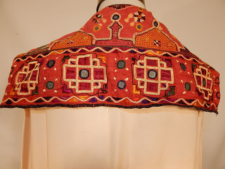 Vintage Indian Gujarati Kutch Work Embroidery Mirrored Art Deco Cocoon Coat
The coat measures 40 inches long, with a 40 inch bust, 40 inch waist and 23 inch long sleeves. 