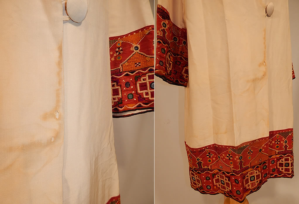 Vintage Indian Gujarati Kutch Work Embroidery Mirrored Art Deco Cocoon Coat
It is in good as-is condition, has not been cleaned, with some faint water spot stains near the bottom front side opening and 3 small frayed holes (see close-up). 