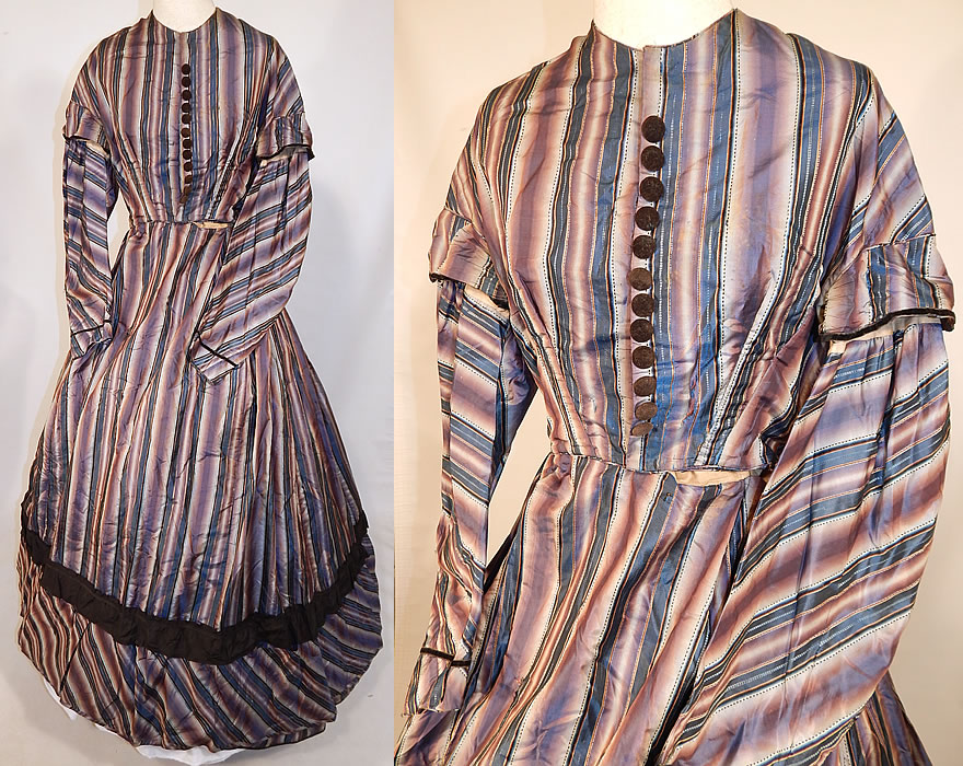 Victorian Civil War Era Purple & Blue Ombre Stripe Silk Hoop Skirt Gown Dress
This antique Victorian Civil War era purple and blue ombre stripe silk hoop skirt gown dress dates from the 1860s. It is made of a purple, blue and black ombre iridescent striped silk taffeta fabric.