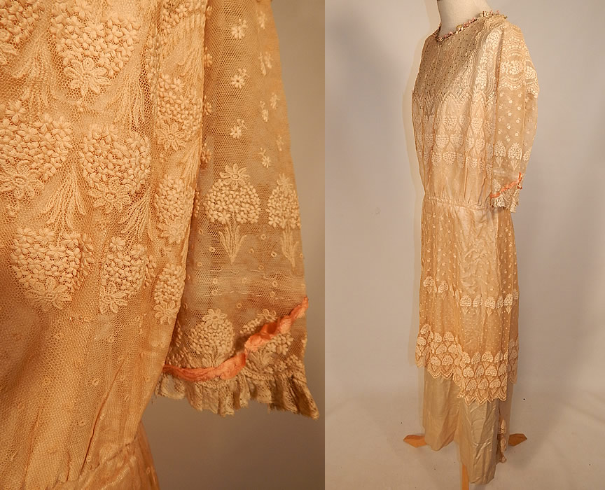Edwardian Belle Epoque Cream Embroidered Net Lace Beaded Rosette Dress
The dress measures 50 inches long, with 40 inch hips, a 26 inch waist and 40 inch bust. 