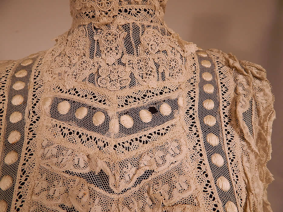 Edwardian Embroidered Polka Dot White Net Lace Applique Bodice Blouse
The top measures 20 inches long, with a 22 inch waist, 34 inch bust and 12 inch neck. It is in good condition, but has not been cleaned, with a few faint small age spot stains and frayed holes (see close-up). This is truly a wonderful piece of antique textile lace wearable art! 