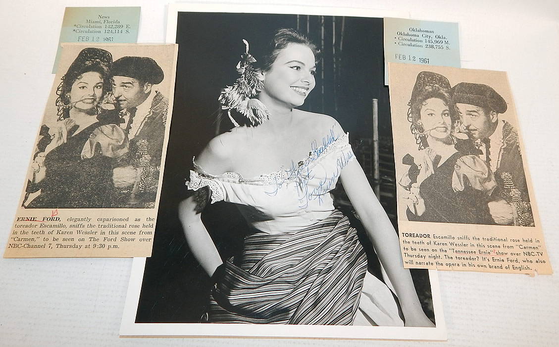 Vintage White Silk de Chine Silver Beaded One Shoulder Grecian Goddess Gown
This custom made evening gown is from the estate of Karen Wessler who performed on the Tennessee Ernie Ford Show as one of "The Top Twenty", Ernie's back-up group (see publicity photo stills below). It is in good condition, but has not been cleaned, with some faint makeup stains around the inside top lining and slight discoloration under the arms. This is truly a wonderful piece of custom made wearable art! 