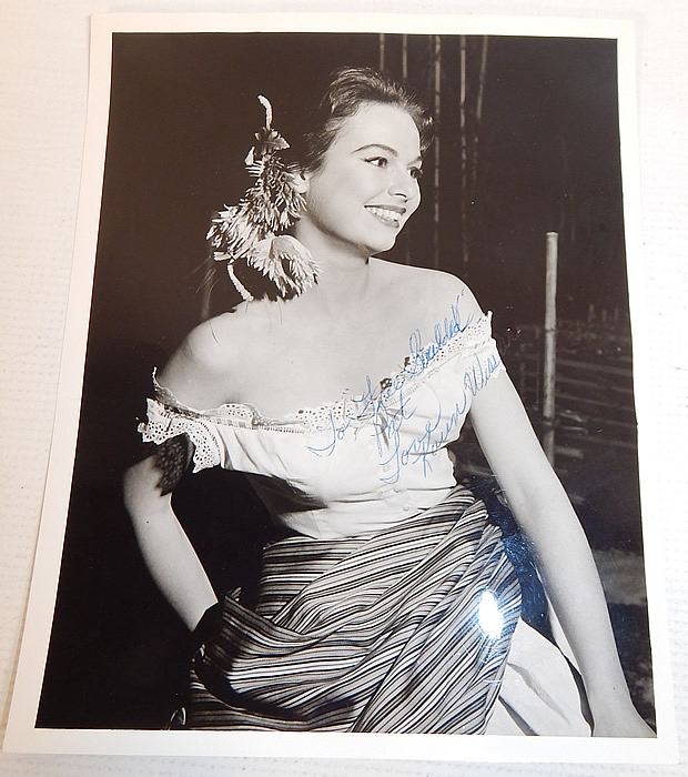 Vintage White Silk de Chine Silver Beaded One Shoulder Grecian Goddess Gown
This custom made evening gown is from the estate of Karen Wessler who performed on the Tennessee Ernie Ford Show as one of "The Top Twenty", Ernie's back-up group (see publicity photo stills below).
