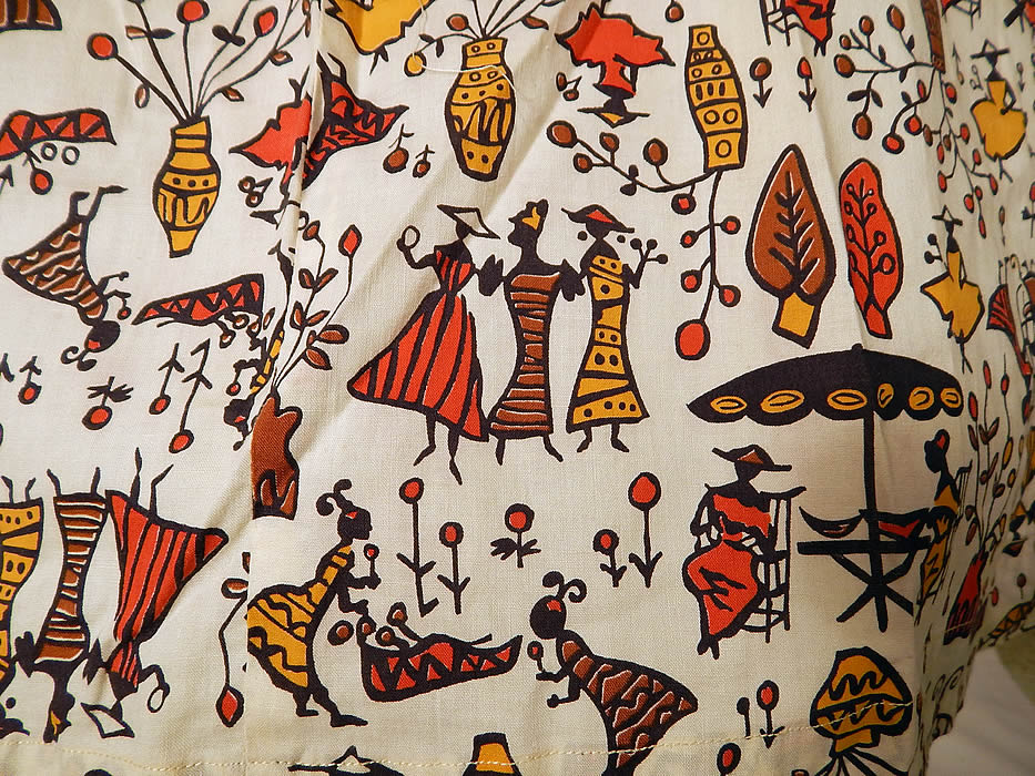 Vintage Cotton Caribbean African Women Novelty Print Circle Skirt Halter Dress Jacket
This retro summer sun dress has a halter top with brass studs, rhinestone beading around the neckline, a full circle skirt, matching fabric belt, buckle and back zipper closure.