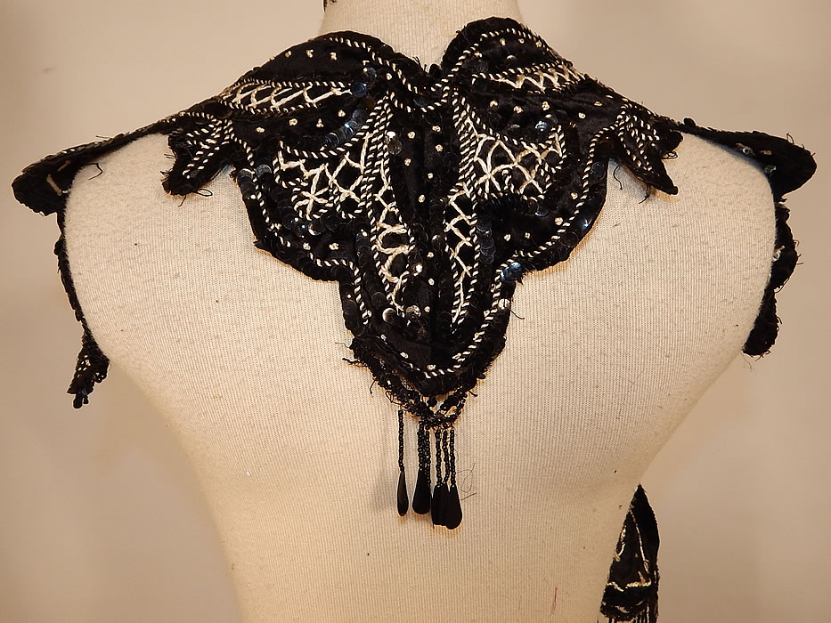 Edwardian Black Silk Velvet White Soutache Embroidery Dress Trim Collar
This sensational shawl collar dress trim has a scalloped edging and unusual shape. The collar measures 36 inches long and 8 inches wide. 