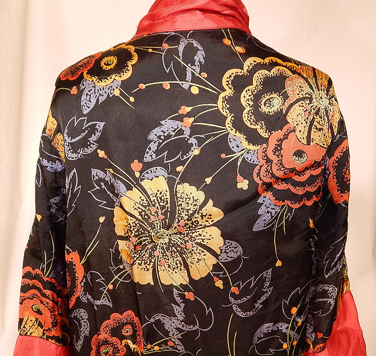 Vintage Art Deco Red & Black Flower Print Silk Flapper Kimono Robe Coat
The robe measures 43 inches long, with 44 inch hips, a 44 inch waist, 44 inch bust and 22 inch long sleeves. It is in good condition, with only a few tiny snags, pulls along the red trim front opening. This is truly a wonderful piece of Art Deco wearable art!