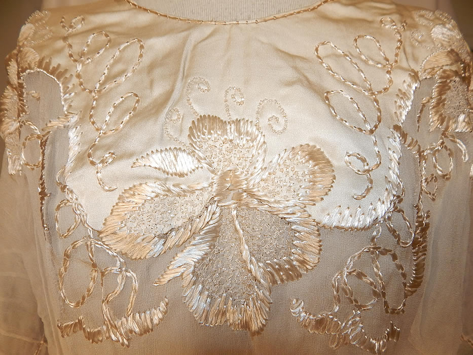 Edwardian Silk Embroidered Beaded Blue Ribbon Sash Belted Wedding Dress
This beautiful bridal wedding dress has a tea length skirt, with 3/4 length sheer sleeves, a wide blue silk ribbon sash belted bow side waist, inside hook, snap closures on the back and is lined only in the top.