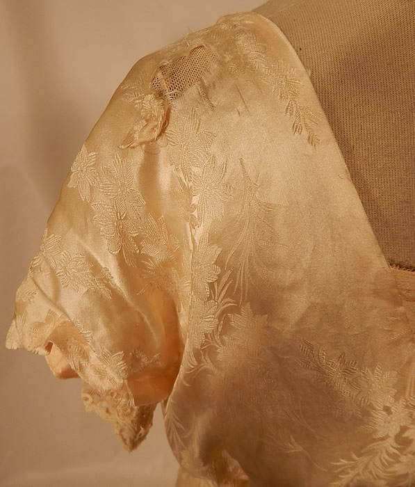 Edwardian Titanic Silk Damask Brocade Tambour Embroidery Lace Wedding Gown Dress
It is in good as-is condition, has not been cleaned, with some discoloration age spot staining on the lace front neckline and a frayed hole underarm and on the shoulder (see close-up). 