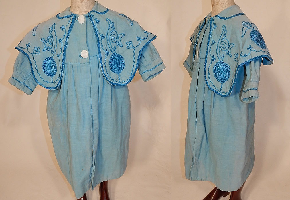 Edwardian Blue Embroidered Soutache Braided Trim Childs Winter Coat
This antique Edwardian era blue embroidered soutache braided trim child's winter coat dates from 1910. It is made of a blue soft cotton fabric, with a slightly darker shade of blue silk soutache embroidered braided rope trim along the collar and sleeve cuffs.
