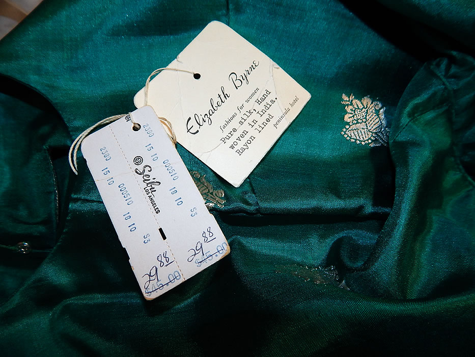 Vintage Elizabeth Bryne Seibu Hong Kong Green Silk Sari India Cocktail Dress NWT
There is a "Elizabeth Bryne Fashions for Women Peninsula Hotel" and "Seibu Made in Hong Kong" labels and still has the original paper tags, price tag attached. It is in excellent condition and has never been worn, NWT. This is truly a wonderful piece of wearable art!