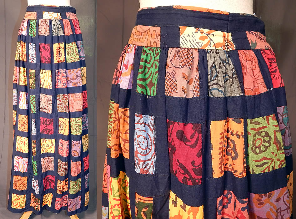 Vintage Something Oscar de la Renta Patchwork Batik Boho Maxi Skirt
This vintage Something Oscar de la Renta patchwork batik boho maxi skirt dates from the 1970s. It is made of a navy blue cotton fabric, with colorful batik fabric squares done in a patchwork effect.