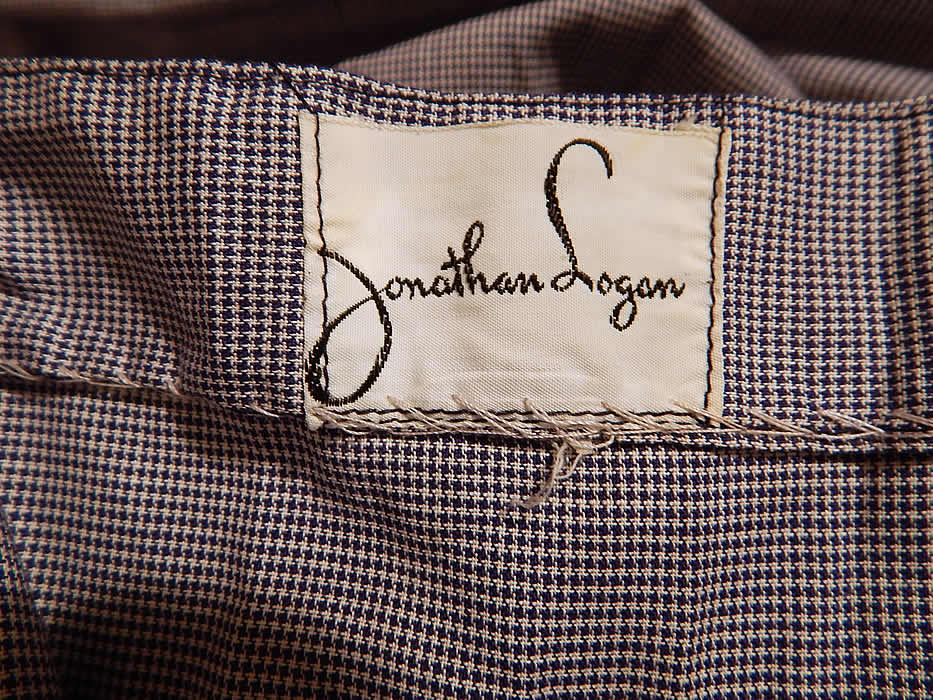 Vintage Jonathan Logan Navy Blue Houndstooth Cotton Circle Skirt Halter Dress
There is a "Jonathan Logan" designer label and still has the original paper tags attached for the 1950-1951 Fashion Academy Award. 
