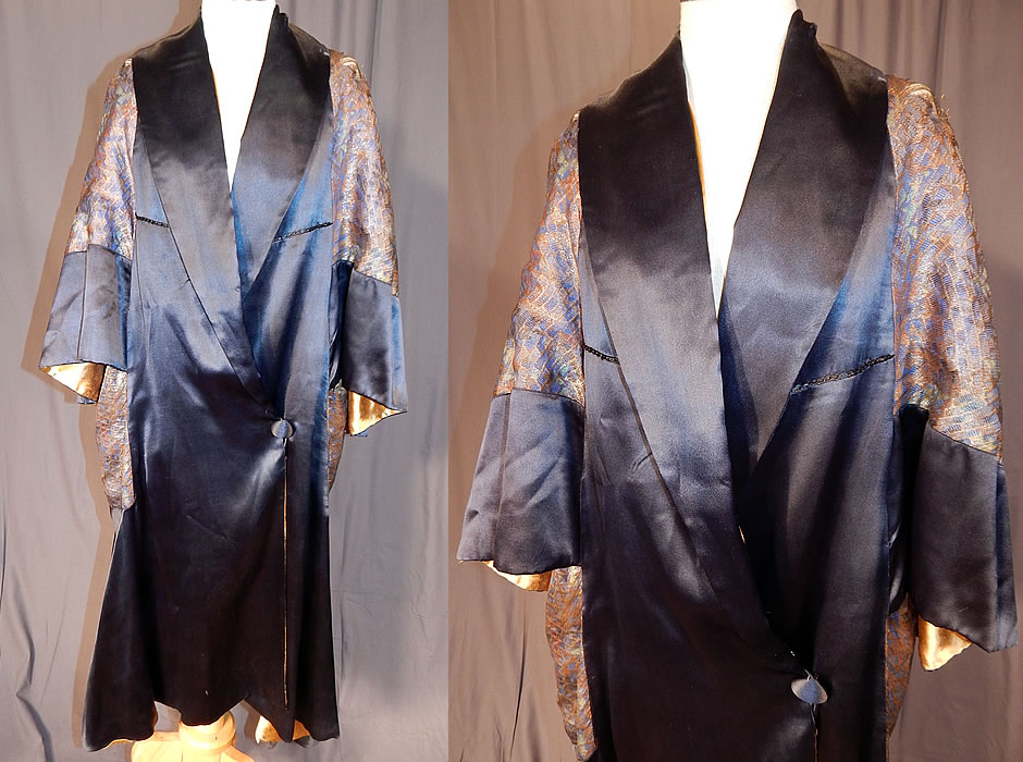 Vintage Art Deco Navy Blue Silk Gold Lamé Lame Flapper Opera Coat Cape Cloak
This vintage Art Deco navy blue silk gold lamé flapper opera coat cape cloak dates from the 1920s. It is made of a blue and gold metallic lamé thread woven fabric in an abstract geometric square cube pattern design. There is a dark navy blue silk satin fabric border edging, skirt and collar trim.
