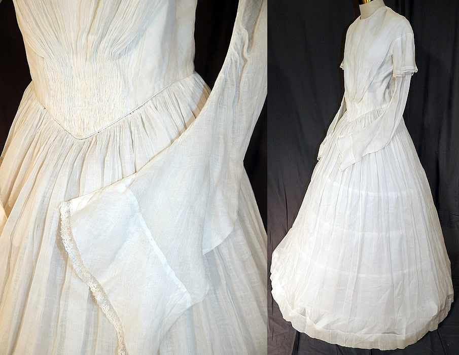 Victorian Era White Muslin Hoop Skirt Wedding Gown Dress
This early bridal wedding gown dress has long layered tiered tapered sleeves with a flared laced cuff under sleeve, a triangle shape bodice top with gathered cartridge pleats V point fitted waist, long full hoop skirt (hoop not included underneath), brass hook closures down the back and only the top is lined.