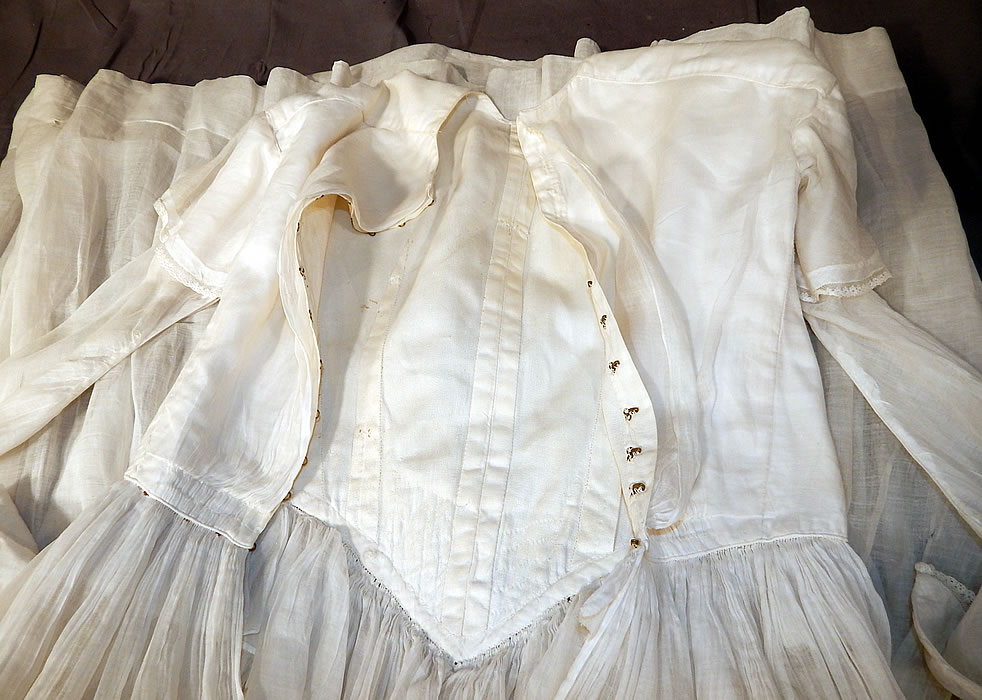 Victorian Era White Muslin Hoop Skirt Wedding Gown Dress
This would be perfect for display or design and is truly a rare and wonderful piece of early bridal Victoriana textile art!