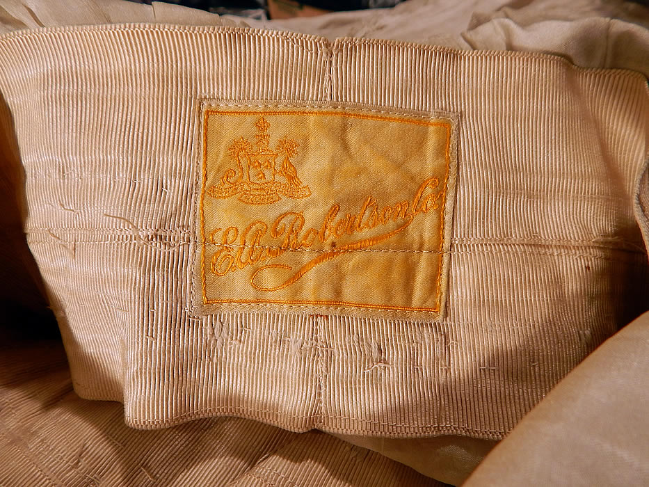 Vintage Robe de Style White Silk Embroidered Piano Shawl Lace Wedding Dress
It is fully lined and has an "E.A. Robertson Co." label sewn inside the waistband. 