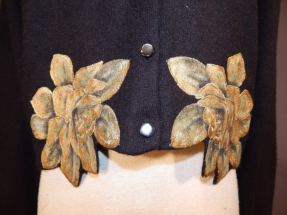 Vintage Marge Wing Black Cashmere Gold Hand Painted Magnolia Cardigan Sweater
This stunning cardigan sweater has long full sleeves, plastic buttons down the front for closure and is unlined. 