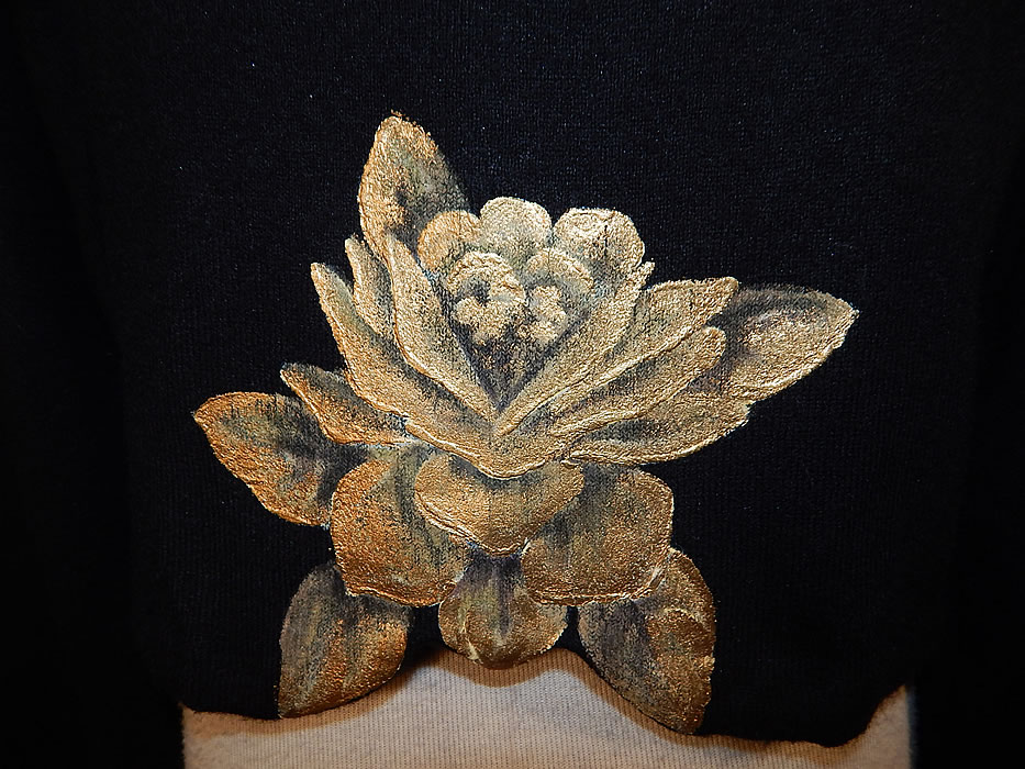 Vintage Marge Wing Black Cashmere Gold Hand Painted Magnolia Cardigan Sweater
The sweater measures 18 inches long, with a 34 inch waist, 36 inch bust and 20 inch long sleeves.