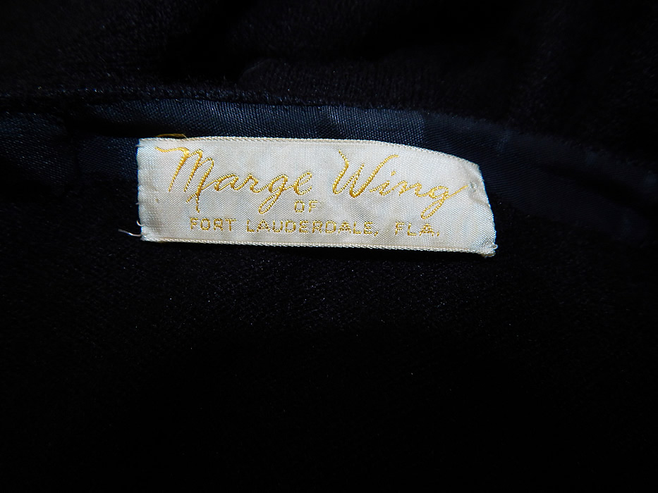 Vintage Marge Wing Black Cashmere Gold Hand Painted Magnolia Cardigan Sweater
There is a "Marge Wing of Fort Lauderdale, FLA." label sewn inside. It is in excellent condition. This is truly a wonderful piece of hand painted wearable art!