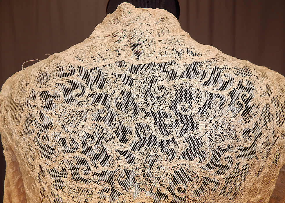 Vintage Silk Ribbon Rosette Trim Cream Tambour Embroidery Net Lace Jacket
The jacket measures 26 inches long, with a 28 inch waist, 34 inch bust and 23 inch sleeve. It is in good condition, with two tiny pin holes and a small fray on the neck. This is truly a wonderful piece of wearable rosette ribbon work lace art!
